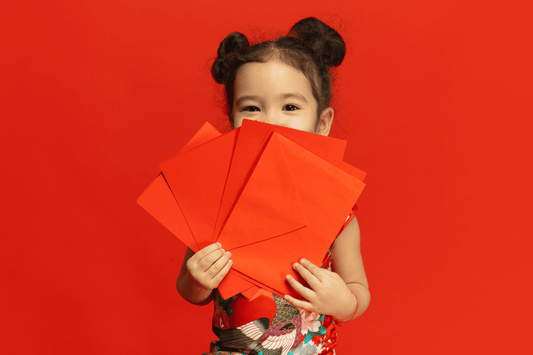 children receiving red envelope chinese new year